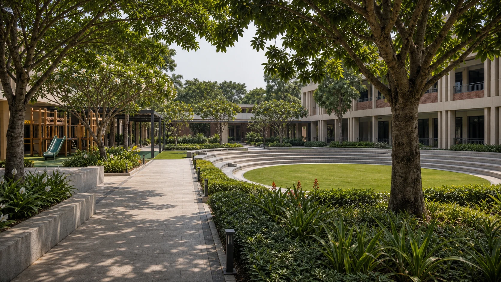 Institutional courtyard garden with shade trees, seating, and maintainable planting beds.