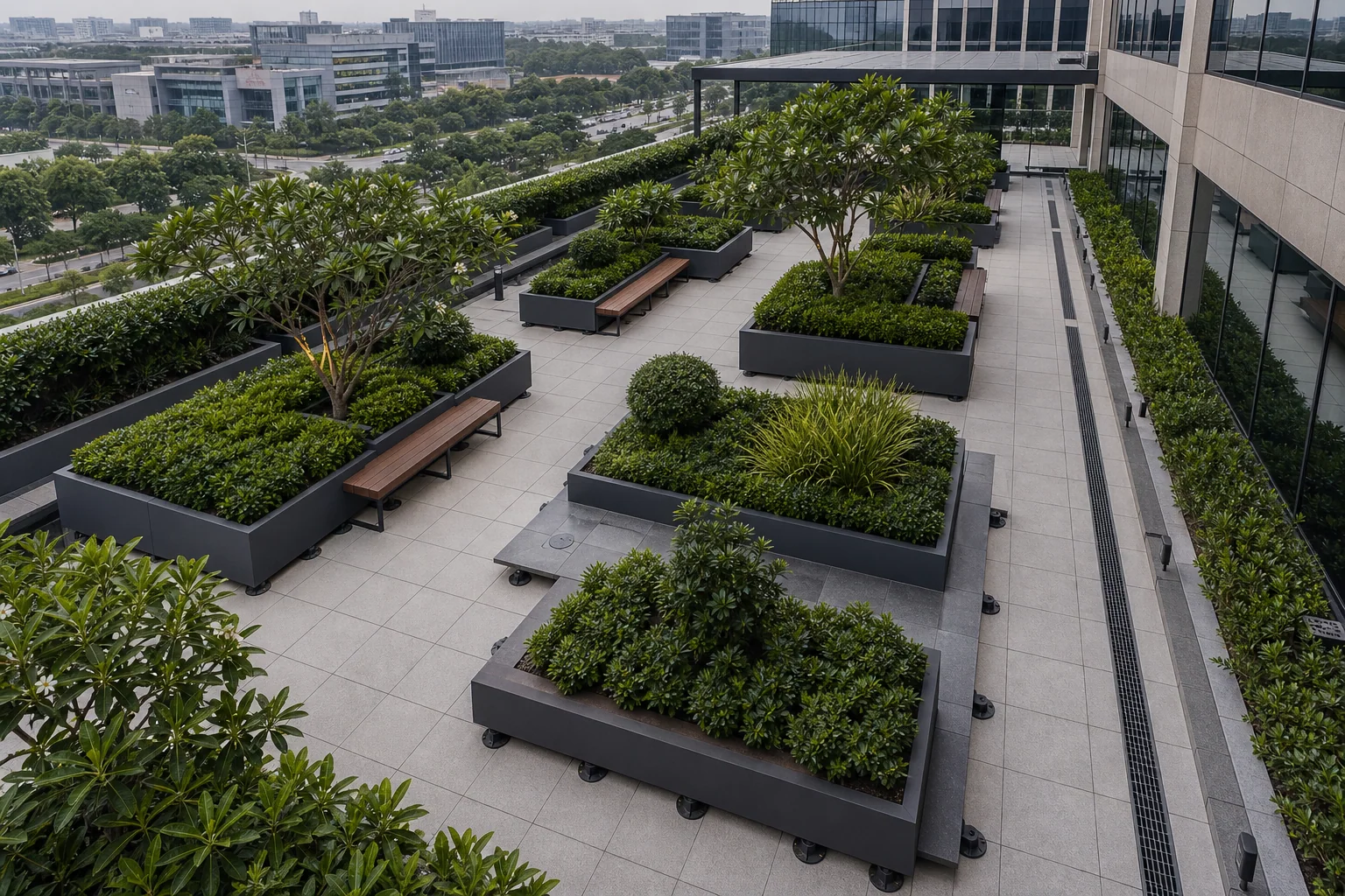 Layered rooftop planter with shrubs, groundcover, and drainage-aware terrace garden edge.