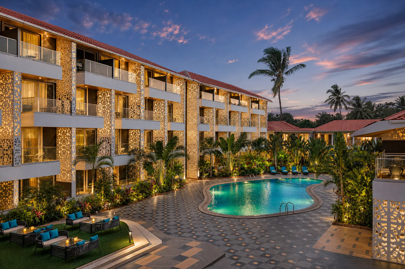 Hyatt Place Goa Candolim elevated twilight courtyard with blue pool water and warm architectural lighting