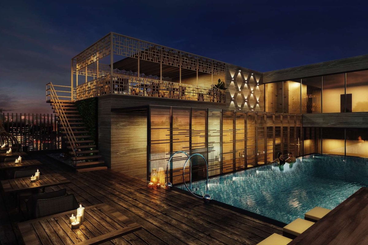 Rooftop pool and lounge area at Radisson Lucknow, landscaped by Four Leaf Landscape.